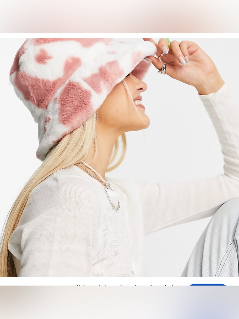 ASOS Design roll back fuzzy bucket hat in pink cow print M/L